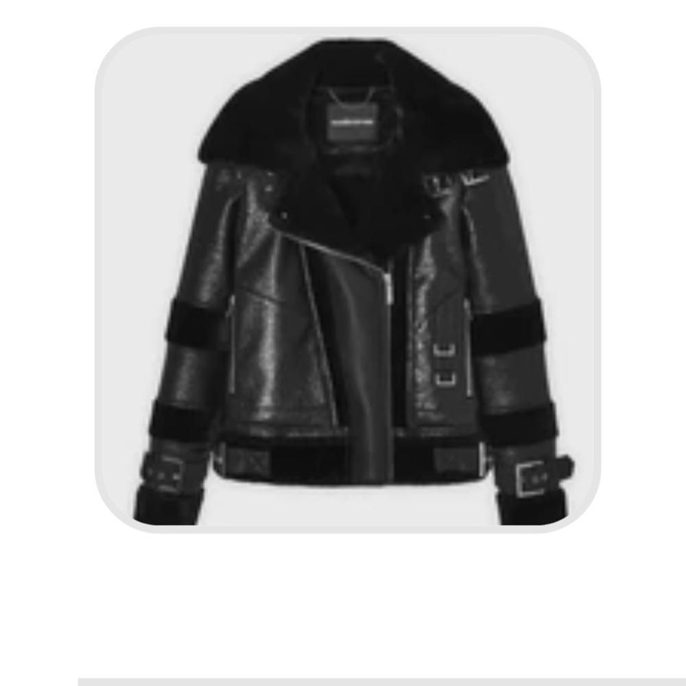 Leather jacket with belts and faux fur detail